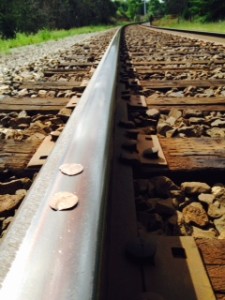 Coins on a track